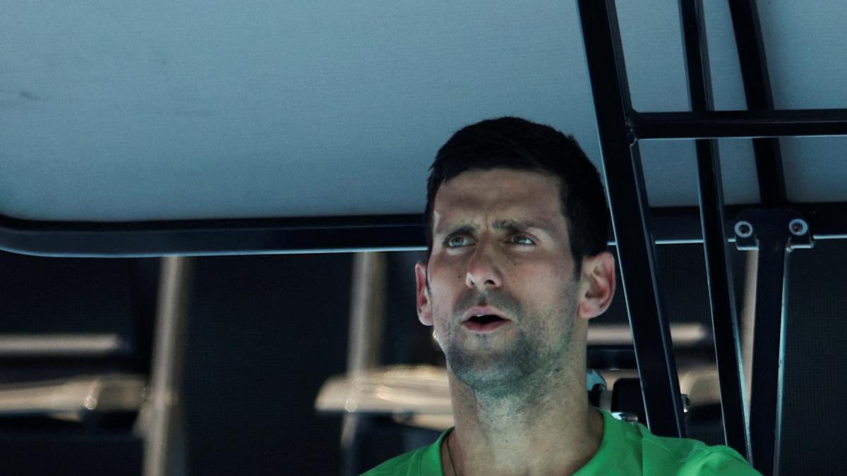 Serbian tennis player Novak Djokovic rests at Melbourne Park as questions remain over the legal battle regarding his visa to play in the Australian Open