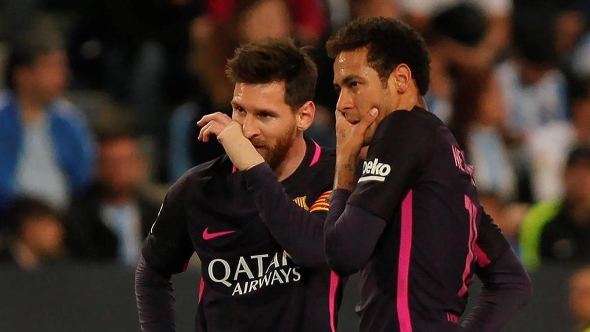 Messi y Neymar, durante el partido del Barça en Málaga.