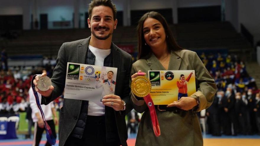Damián Quintero y María Torres, karatecas malagueños.