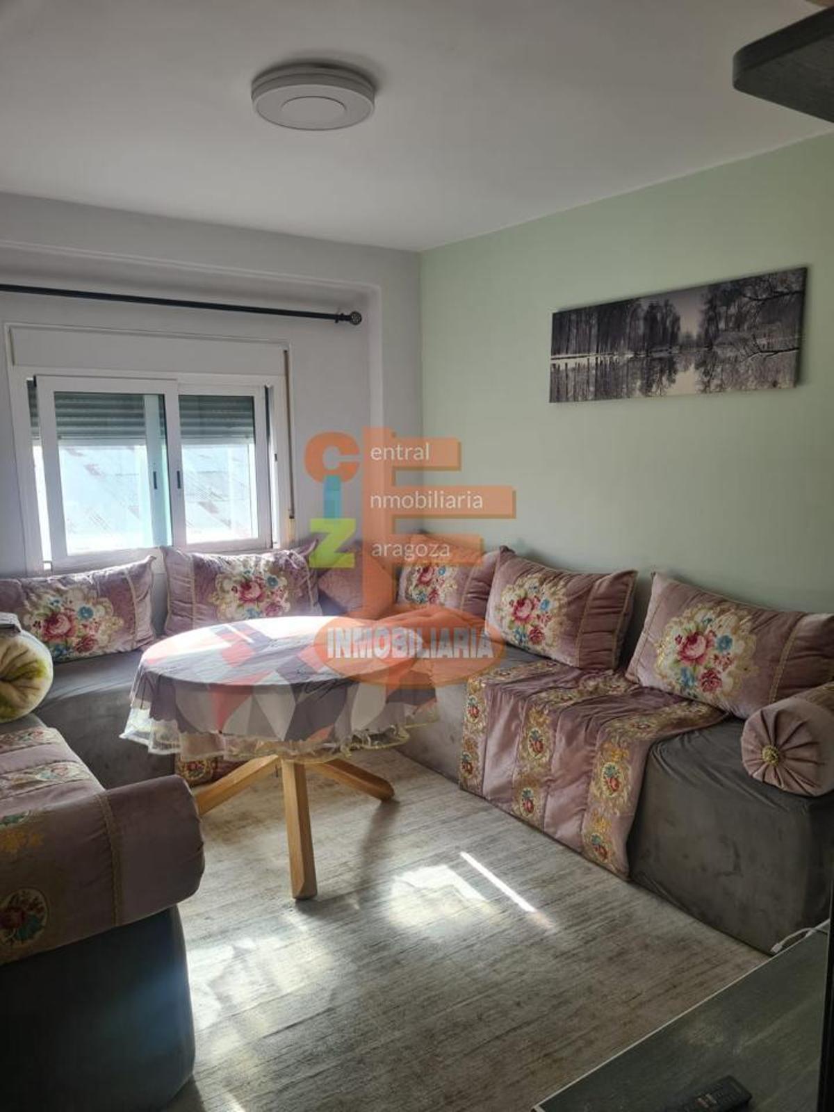 El salón de la casa a la venta en el Oliver