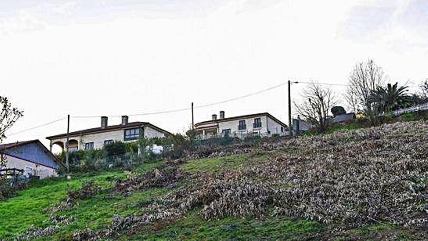 Terrenos y viviendas afectados por el trazado previsto para el vial 18.