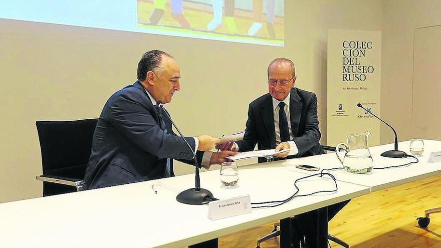 El director Territorial de Caixabank en Andalucía Oriental, Juan Ignacio Zafra, y Francisco de la Torre