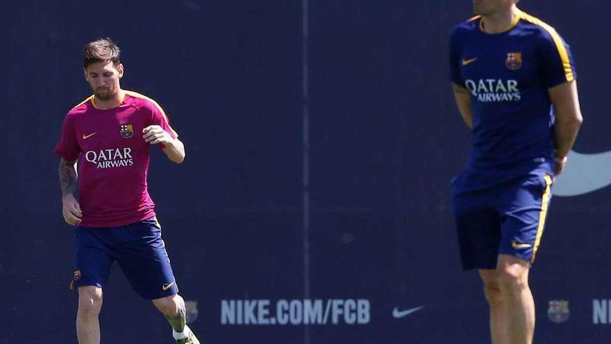 Messi y Luis Enrique, durante un entrenamiento del Barcelona.