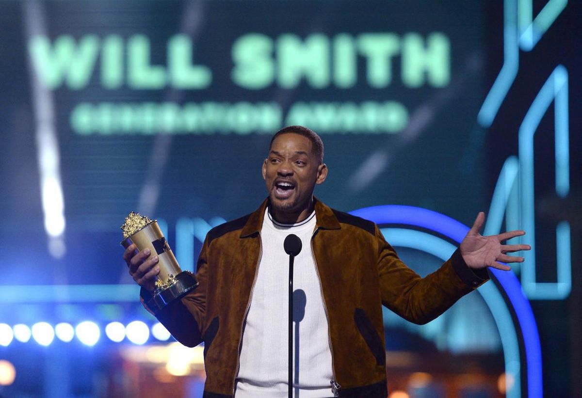 Will Smith accepts the generation award at the MTV Movie Awards at Warner Bros. Studio on Saturday, April 9, 2016, in Burbank, Calif. (Kevork Djansezian/Pool Photo via AP)