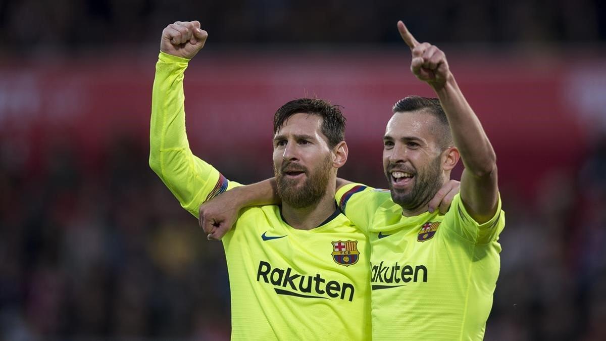 Messi y Alba celebran un gol ante el Girona.