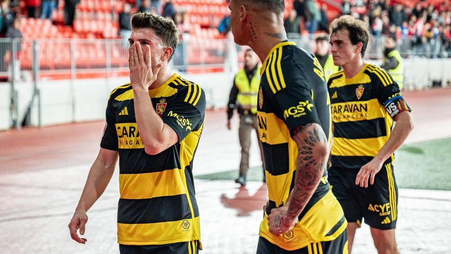 Guti y Francho, junto a Kervin Arriaga, tras la goleada en marzo en Almería.