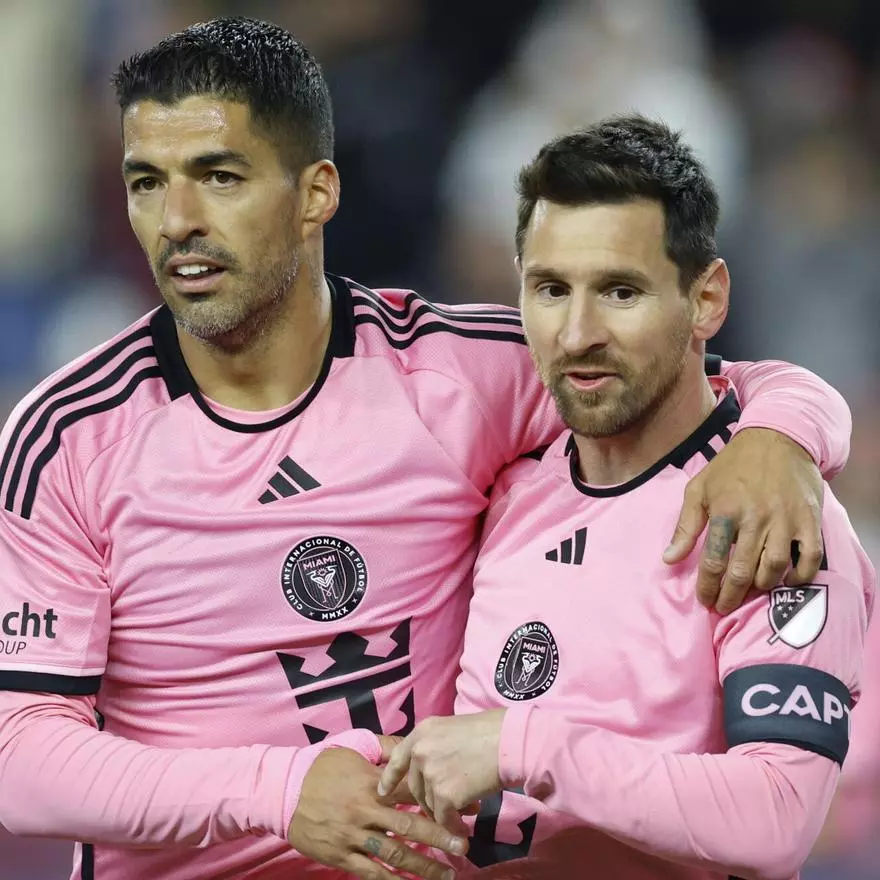Luis Suárez y Leo Messi