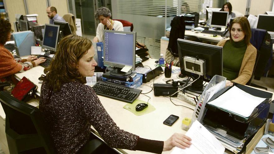 Trabajadores de La Auxiliar de Recaudación.