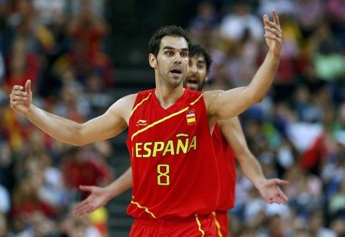 Spain's Calderon and Navarro argue with the officals during the men's quarterfinal basketball match against France at the North Greenwich Arena in London during the London 2012 Olympic Games