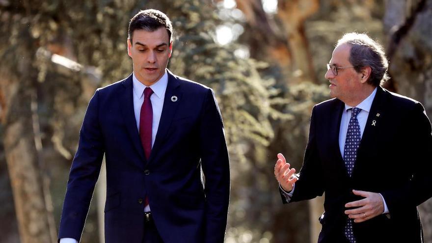 Sánchez y el expresident Quim Torra durante la mesa catalana en febrero de 2020.