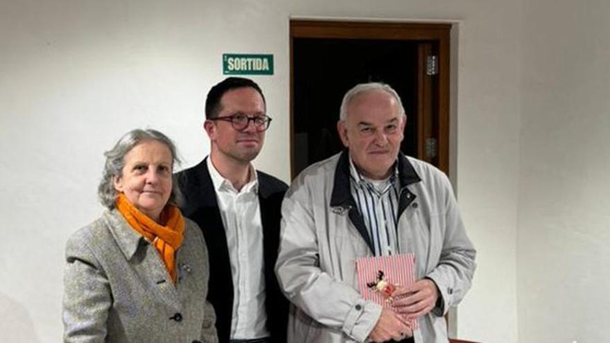 Dos momentos de la conferencia-entrevista.