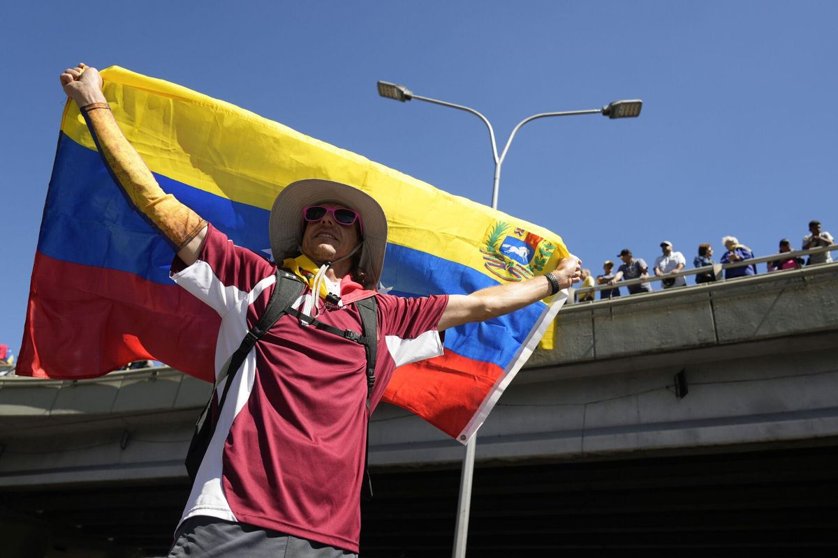 Opponents of Venezuelan President Nicolas Maduro protest the day before his inauguration for a third term in Caracas, Venezuela, Thursday, Jan. 9, 2025. (AP Photo/Ariana Cubillos). EDITORIAL USE ONLY / ONLY ITALY AND SPAIN