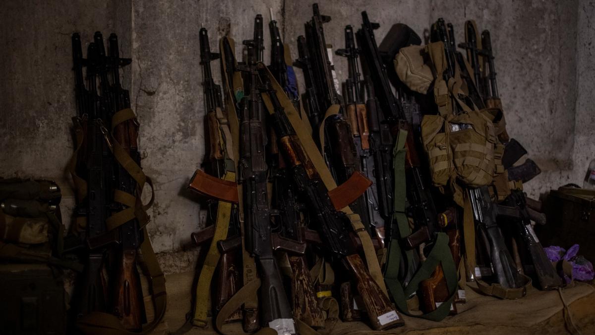 Machine guns of Ukrainian servicemen are seen in a shelter at a position near a frontline in Donetsk Region