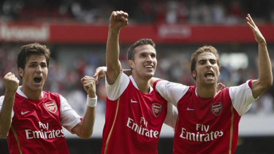 Fábregas, Van Persie y Flamini, jovencísimos, con el Arsenal.