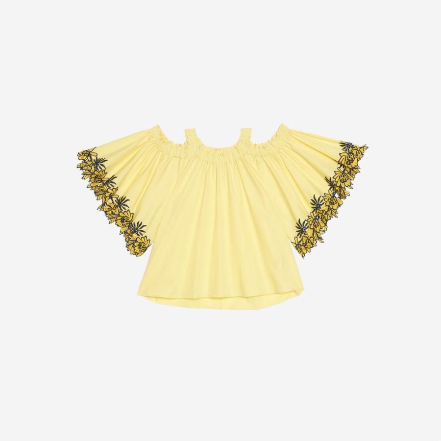 Prendas y complementos en amarillo: top de Sandro