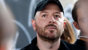 (FILES) Fashion designer for Vetements, Demna Gvasalia talks to people at the end of his men and womens Spring/Summer 2019 collection fashion show, in Paris, on July 1, 2018. Georgian designer Demna is leaving Balenciaga to become artistic director of Gucci, the parent company of both brands, Kering, said on March 13, 2025. Kering and Gucci are delighted to announce the appointment of Demna as the houses new artistic director, starting early July 2025, it said. (Photo by GEOFFROY VAN DER HASSELT / AFP)