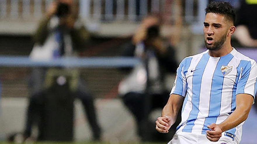 Tighadouini celebra el primer gol del Málaga.