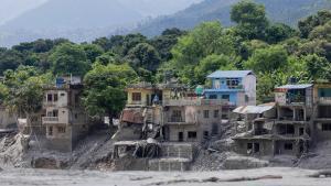 NUWAKOT, Aug. 27, 2026  -- This photo taken on Aug. 27, 2026 shows destroyed buildings along the Trishuli River after a massive flash flood in Nuwakot, Nepal. Nepals National Disaster Risk Reduction Management Authority said that as many as 359 bodies ha