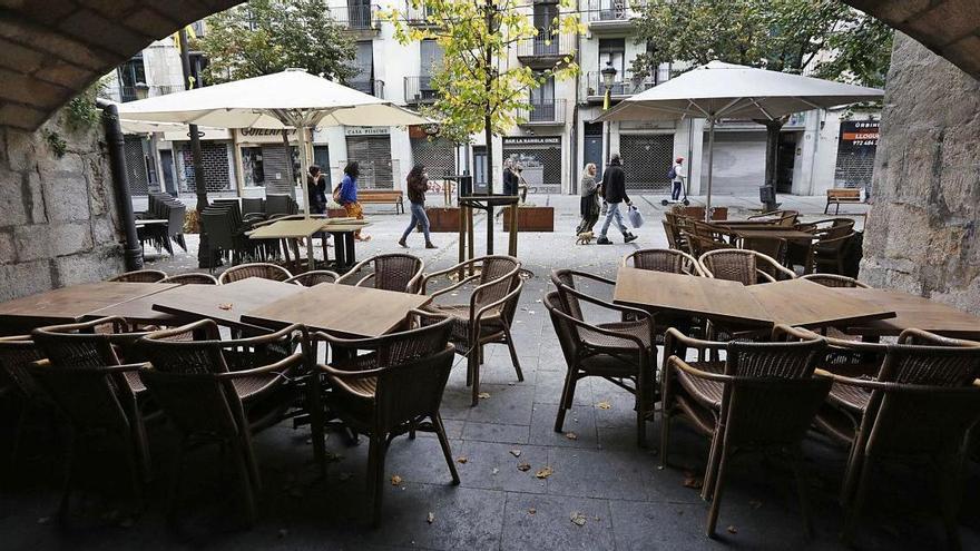 Aspecte d&#039;un bar-restaurant de la ciutat de Girona, els dies passats a mig matí