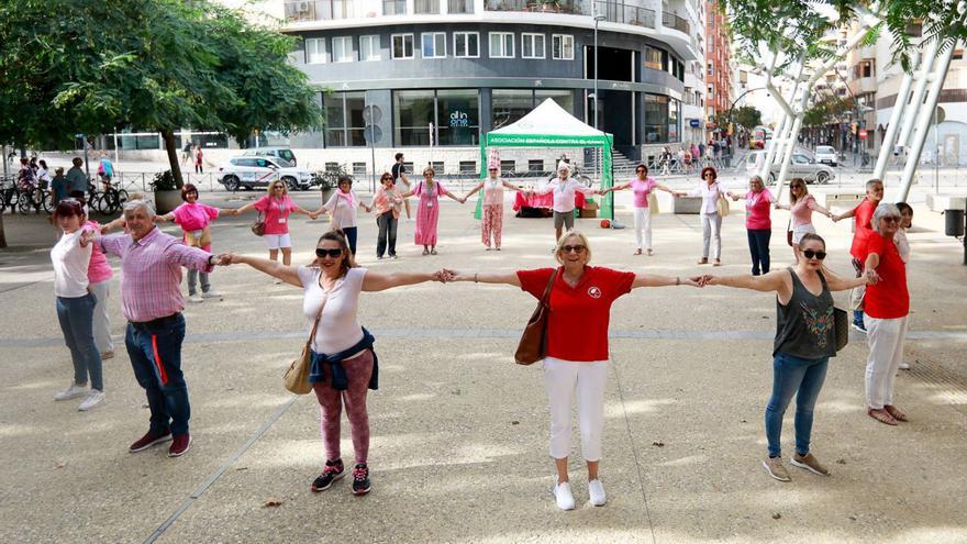 Un «día rosa» contra el cáncer de mama  | FOTOS DE TONI ESCOBAR