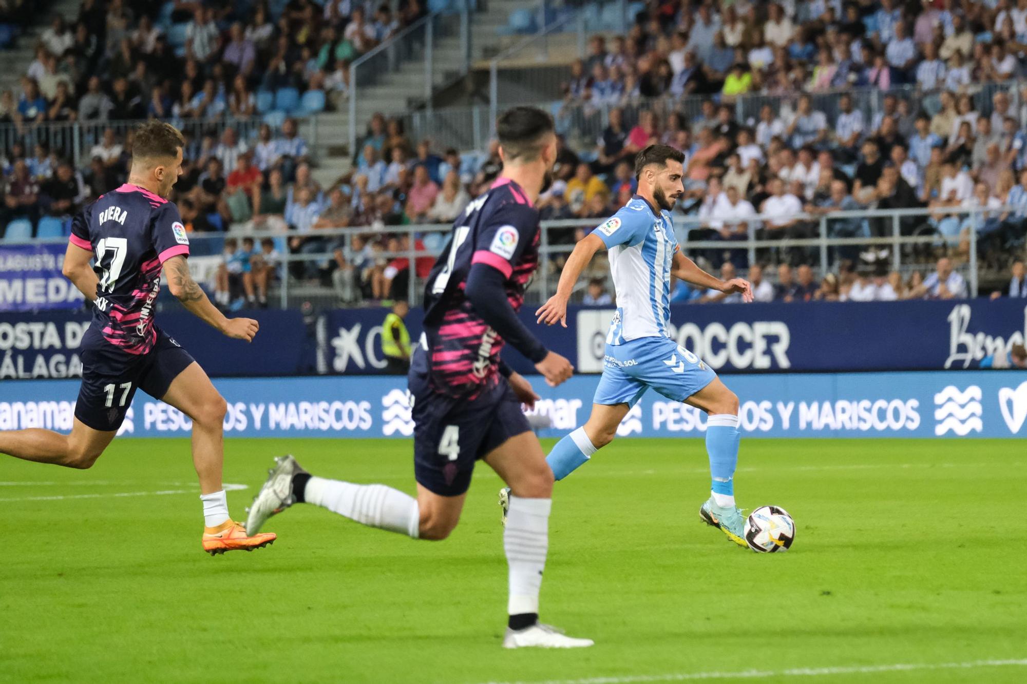 El Málaga CF - Sporting de Gijón, en imágenes