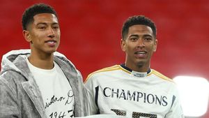 Jobe y Jude Bellingham, durante la celebración de la 15ª Champions del Real Madrid.