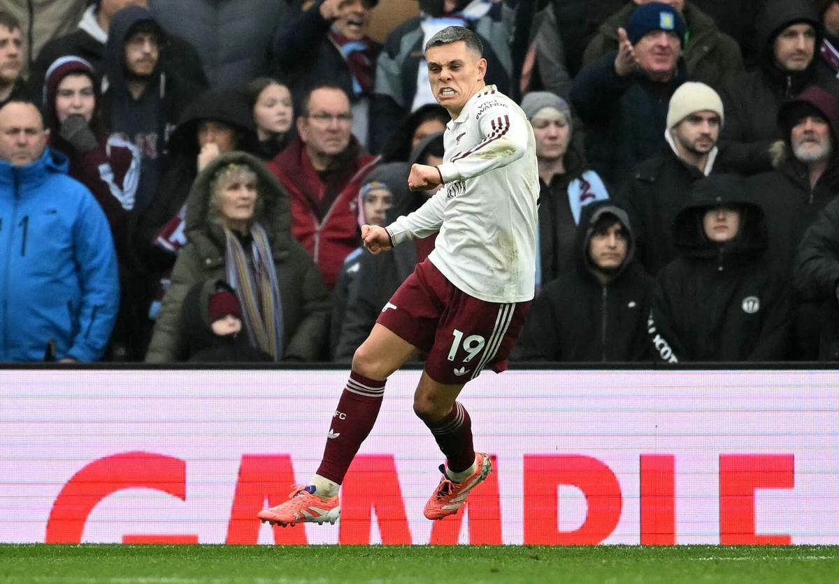 TOPSHOT - Arsenal's Belgian midfielder #19 Leandro Trossard celebrates after scoring the equalising goal during the English Premier League football match between Aston Villa and Arsenal at Villa Park in Birmingham, central England on December 6, 2025. (Photo by JUSTIN TALLIS / AFP) / RESTRICTED TO EDITORIAL USE. No use with unauthorized audio, video, data, fixture lists, club/league logos or 'live' services. Online in-match use limited to 120 images. An additional 40 images may be used in extra time. No video emulation. Social media in-match use limited to 120 images. An additional 40 images may be used in extra time. No use in betting publications, games or single club/league/player publications. /. SEE CAPTION FOR MORE INFORMATION / RESTRICTED TO EDITORIAL USE. No use with unauthorized audio, video, data, fixture lists, club/league logos or 'live' services. Online in-match use limited to 120 images. An additional 40 images may be used in extra time