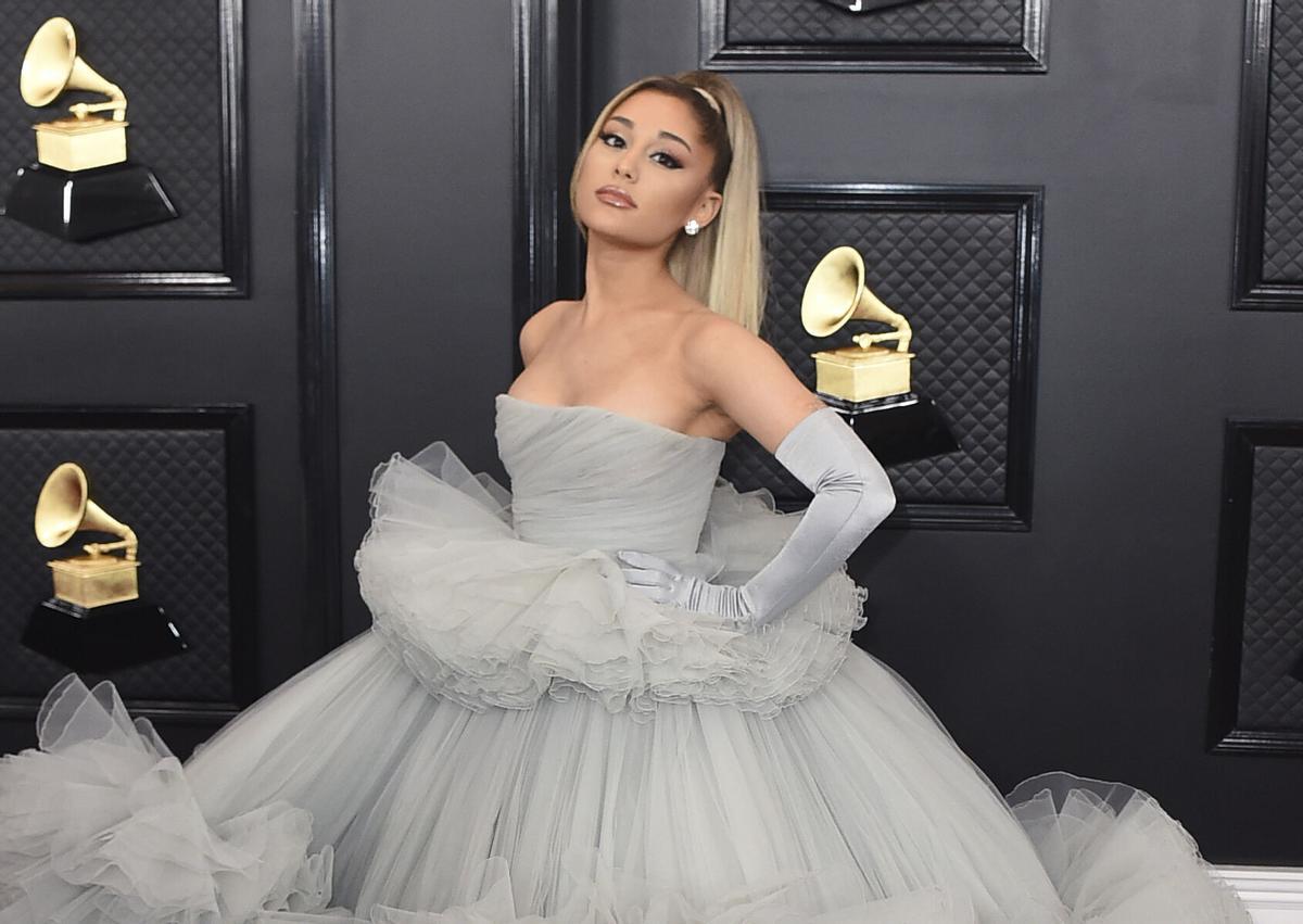 FILE - Ariana Grande appears at the 62nd annual Grammy Awards in Los Angeles on Jan. 26, 2020. Earlier this week, Universal Music Group — which represents big-name artists like Ariana Grande said that it would no longer allow its music on TikTok following the expiration of a licensing deal between the two companies. TikTok users signing on Thursday, Feb. 1, 2024 will see that they are no longer able to search for many popular songs — including music from Grande, Justin Bieber, Billie Eilish and more — under the “sounds” tab. (Photo by Jordan Strauss/Invision/AP, File). 012620126529