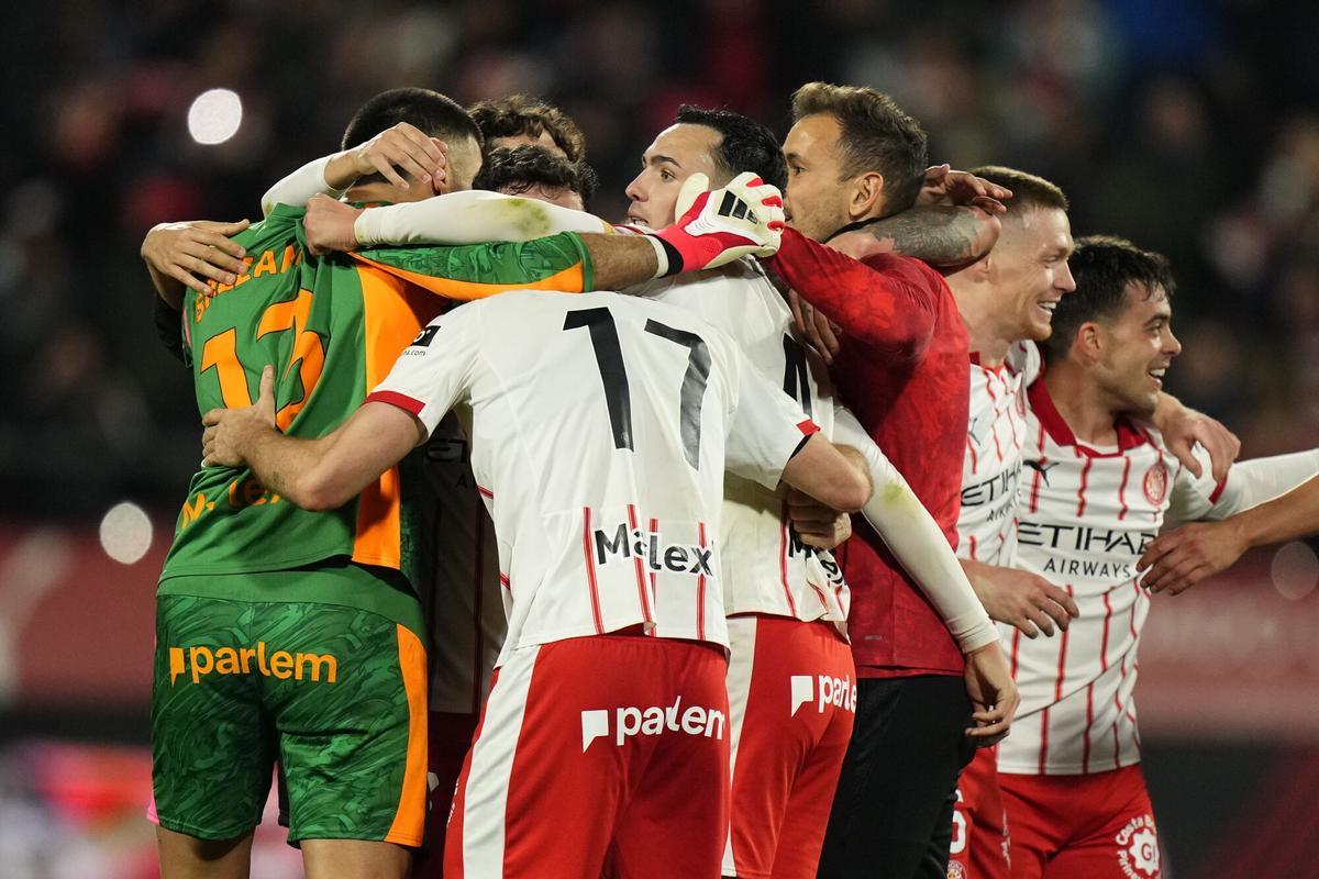 Girona players celebrate the victory at the end of the Spanish LaLiga soccer match between Girona FC and FC Barcelona in Girona, Spain, 16 February 2026. EFE/Siu Wu