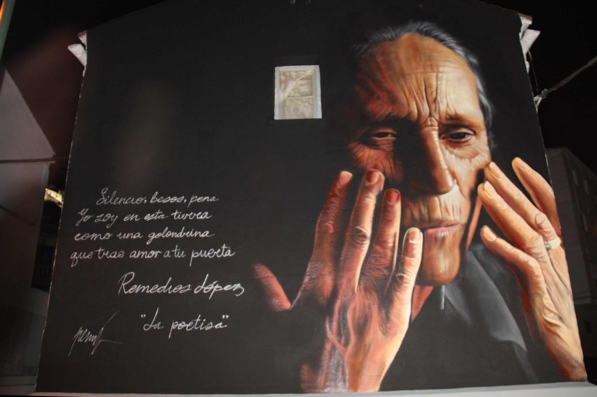 Mural de la poetisa Remedillos López, obra de Nesui SRC.