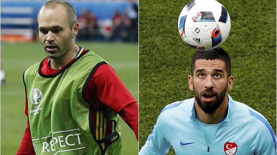 Andrés Iniesta y Arda Turan.