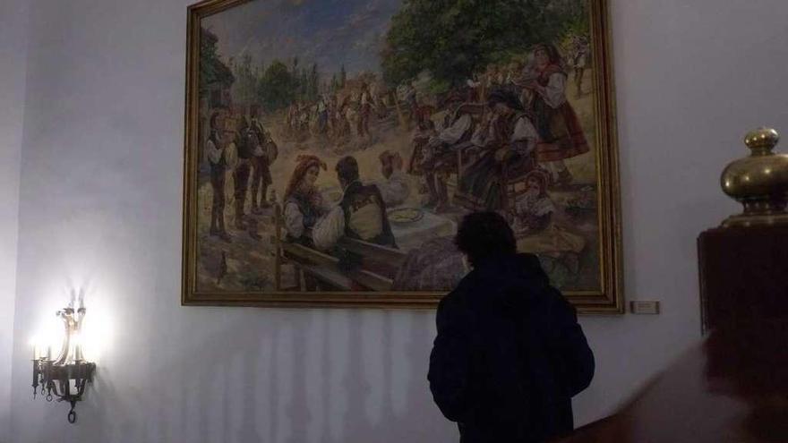 Dos de los cuadros de Ricardo Segundo instalados en las paredes de la Diputación Provincial: &quot;Baile de bodas en Sejas de Aliste&quot; y &quot;Vistiendo a la novia&quot;.