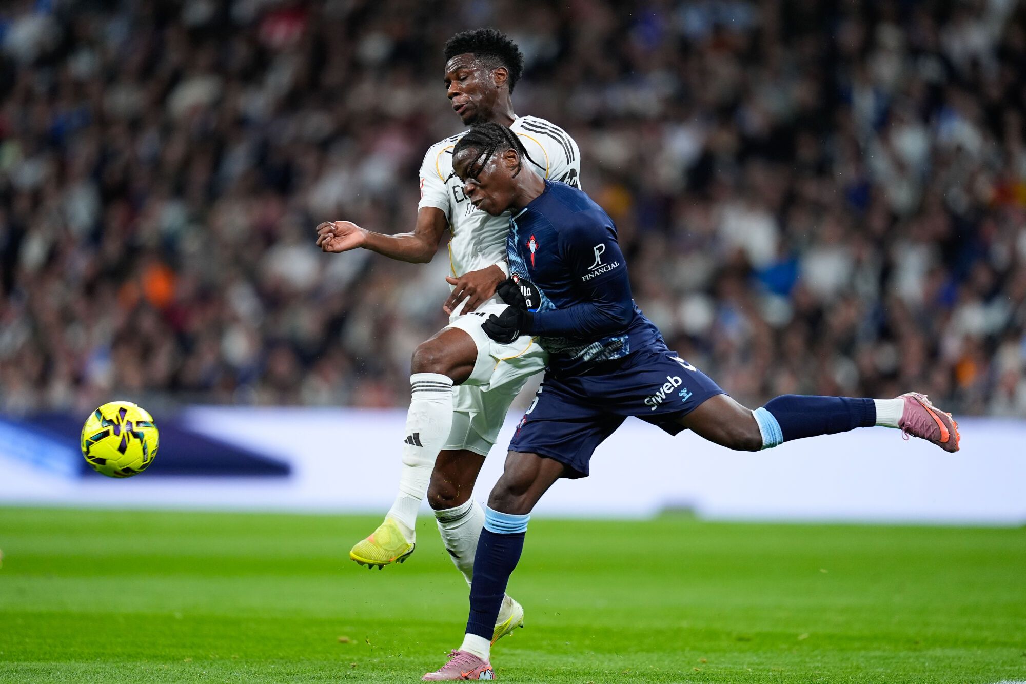 Aurelien Tchouameni of Real Madrid CF and Ilaix Moriba of RC Celta de Vigo compete for the ball during the Spanish League, LaLiga EA Sports, football match played between Real Madrid and RC Celta de Vigo at Bernabeu stadium on December 07, 2025, in Madrid, Spain. AFP7 07/12/2025 ONLY FOR USE IN SPAIN. Dennis Agyeman / AFP7 / Europa Press;2025;SOCCER;SPORT;ZSOCCER;ZSPORT;Real Madrid v RC Celta de Vigo - LaLiga EA Sports;