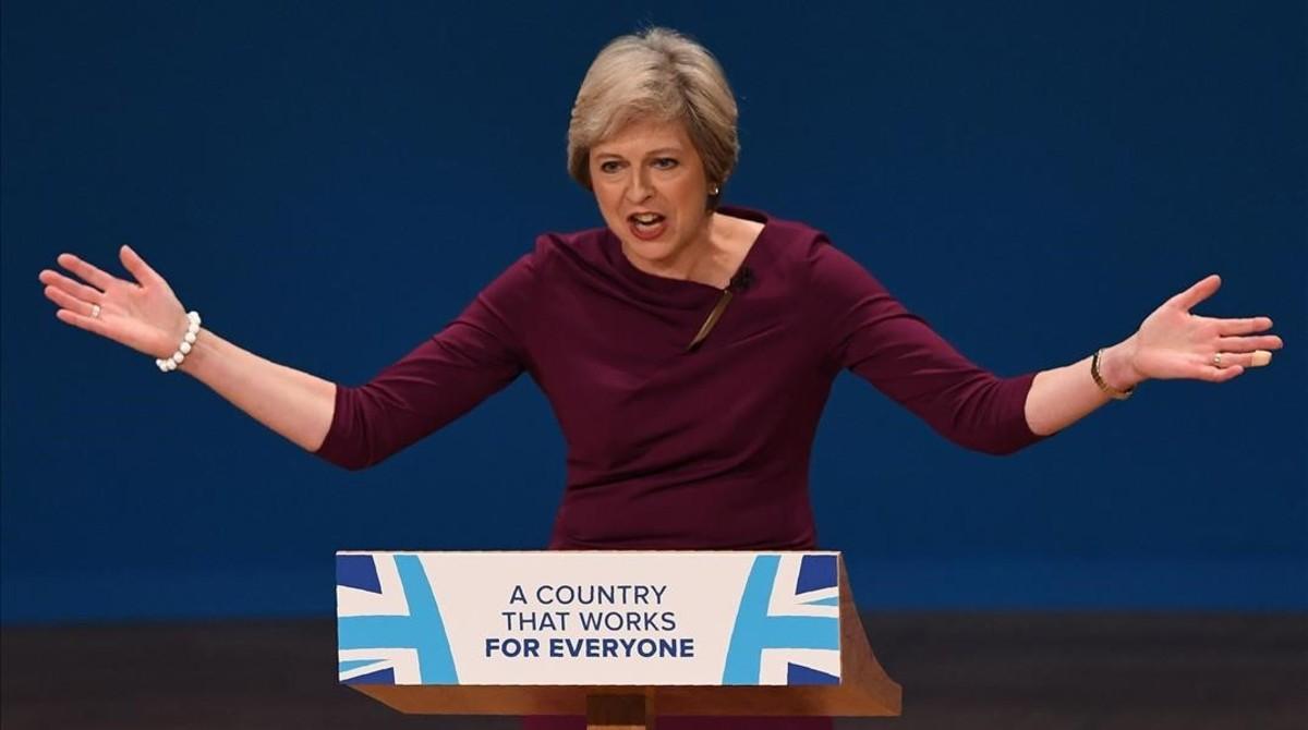 jsauri35799806 british prime minister theresa may gestures as she delivers 161005212840