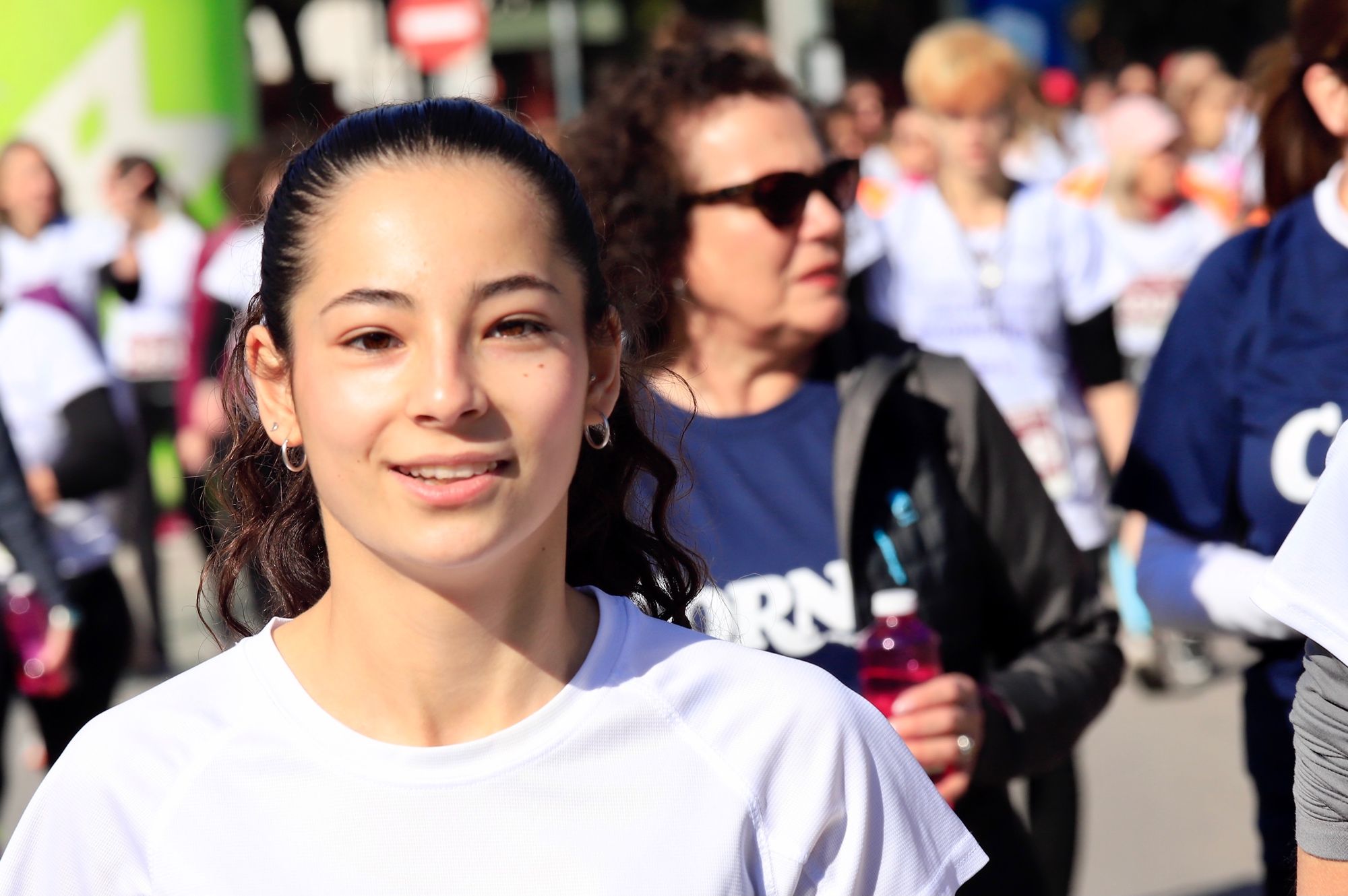 La salida y el recorrido de la Carrera de la Mujer 'inmortalizados' en imágenes