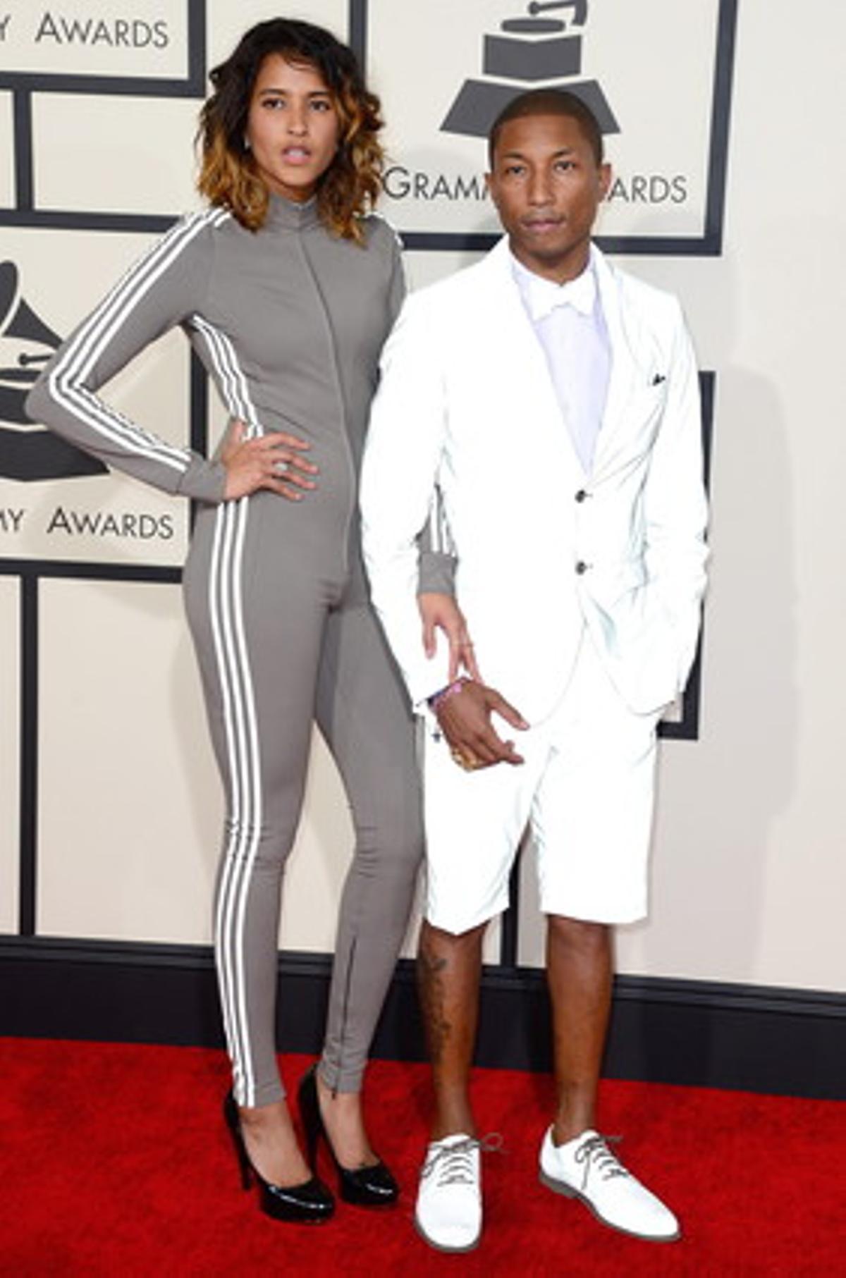 Pharrell Williams i la seva dona, Helen Lasichanh, combinats, en blanc i gris.