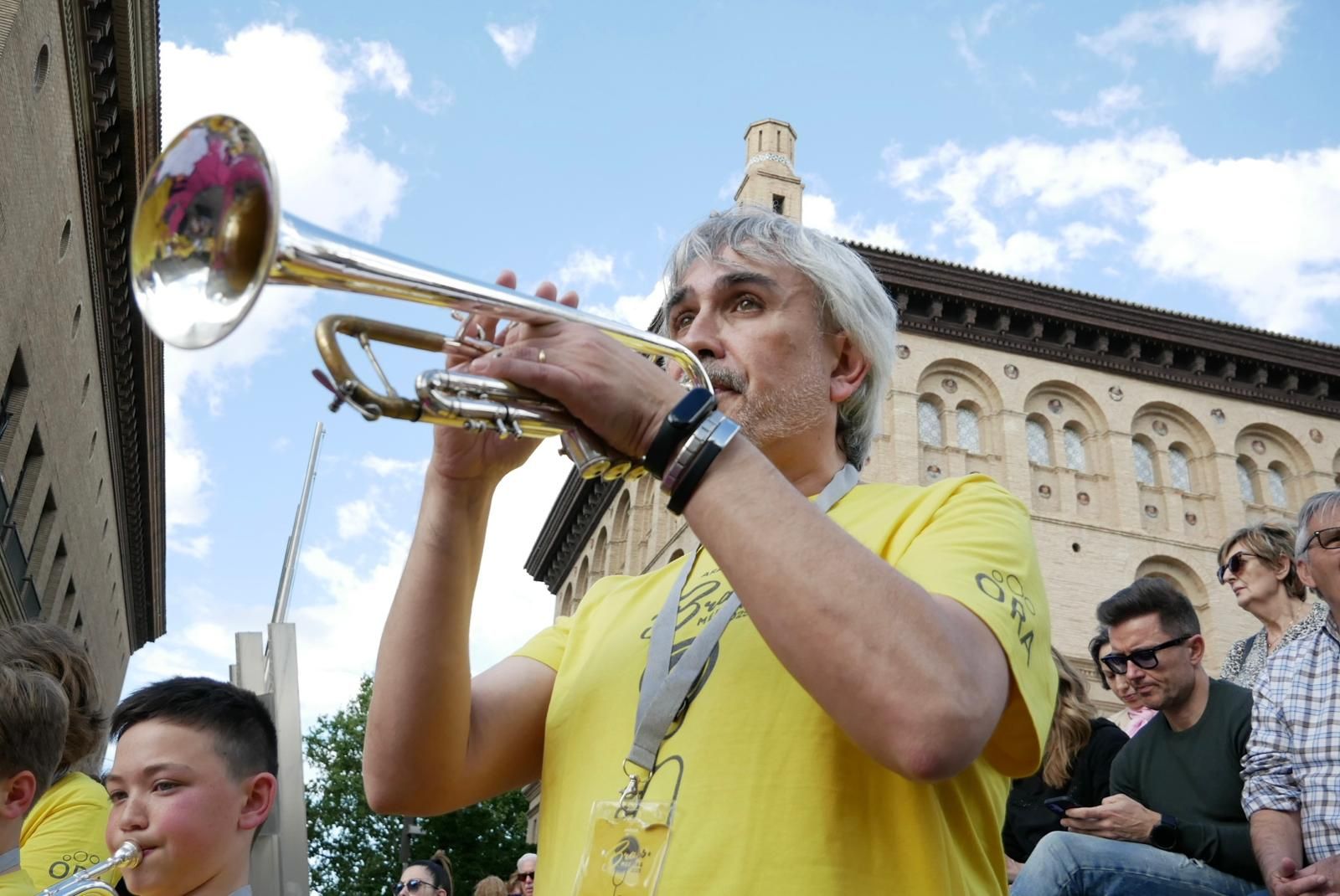 Más de 230 instrumentistas de metal tocan en la plaza del Pilar