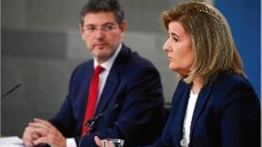 Els ministres de Justicia, Rafael Catalá, i Treball, Fátima Báñez.