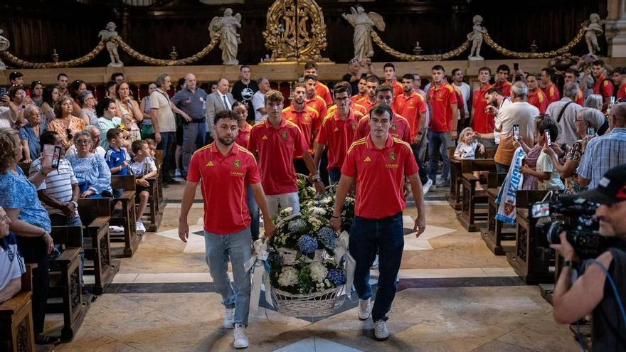 La primera ofrenda a la Virgen con A.GAIN y tras el descenso