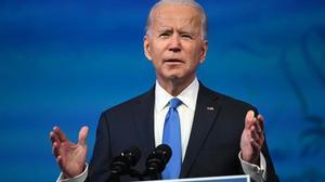 US President-elect Joe Biden delivers remarks on the Electoral college certification at the Queen Theatre in Wilmington  Delaware on December 14  2020  (Photo by ROBERTO SCHMIDT   AFP)