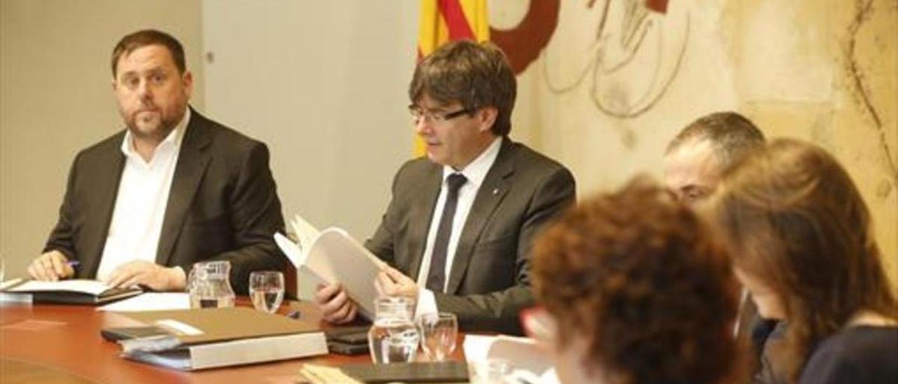 Oriol Junqueras y Carles Puigdemont.