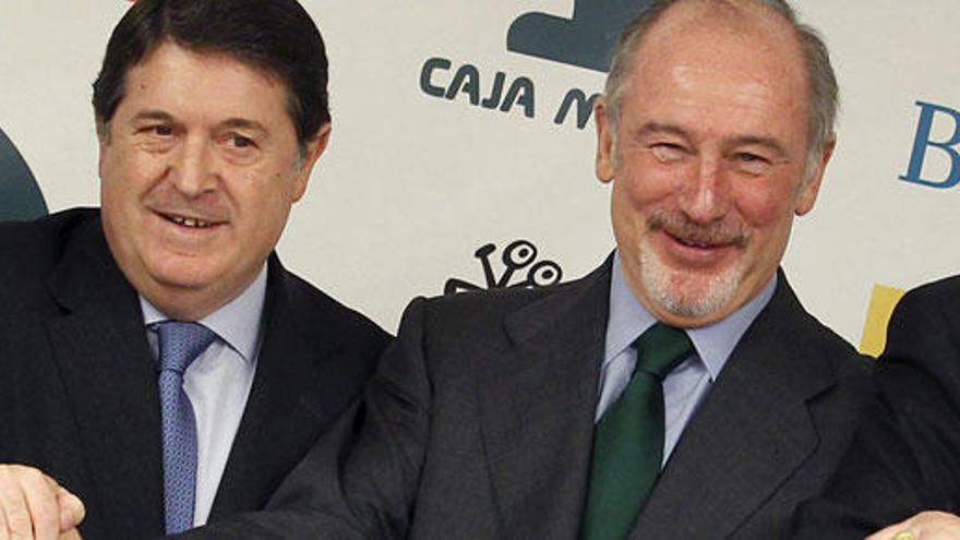 Olivas y Rato, en la creación de Bankia en 2010.