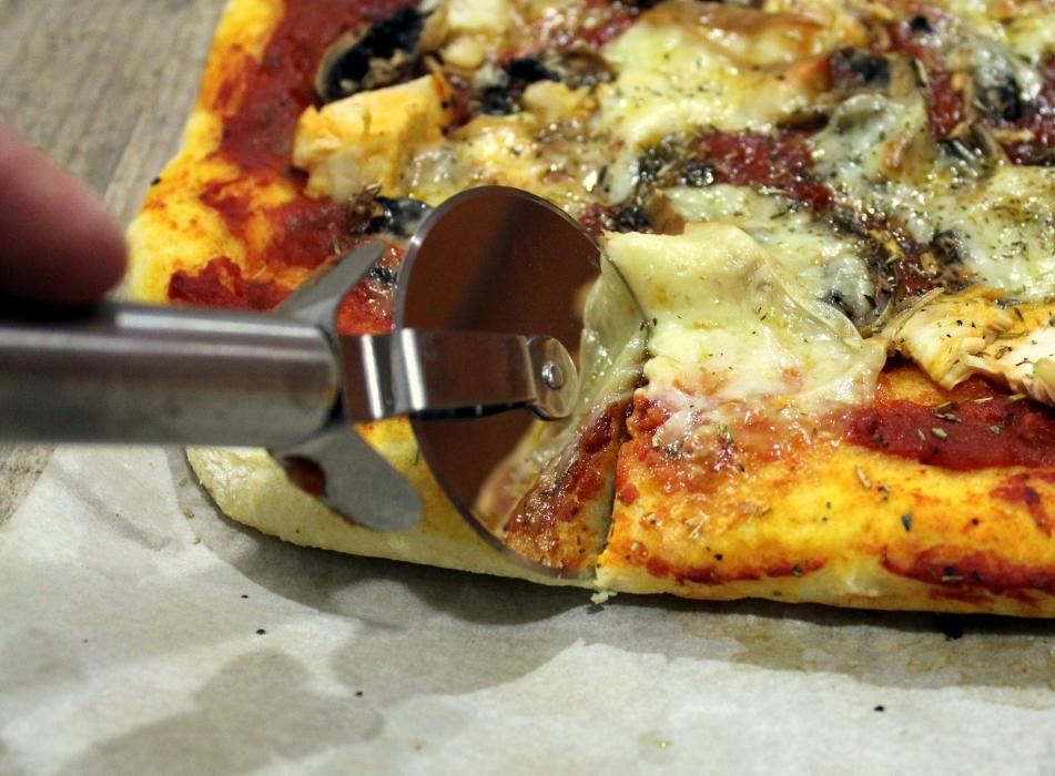 Pizza siciliana o sfiuncini de El aderezo