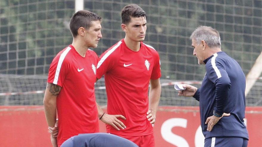 Scepovic y Herrera, en un entrenamiento