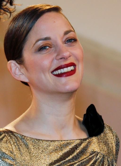 Cast member Marion Cotillard poses on the red ...