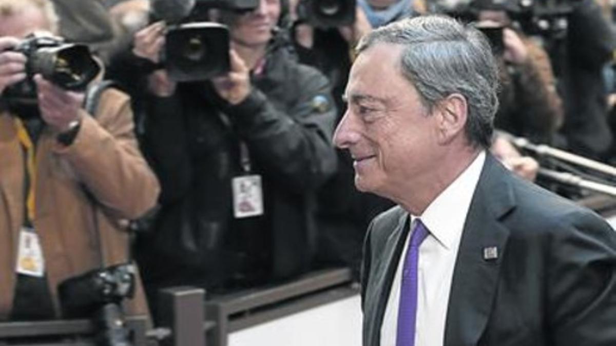 Mario Draghi, presidente del BCE, ayer en la reunión de la Cumbre Europea.