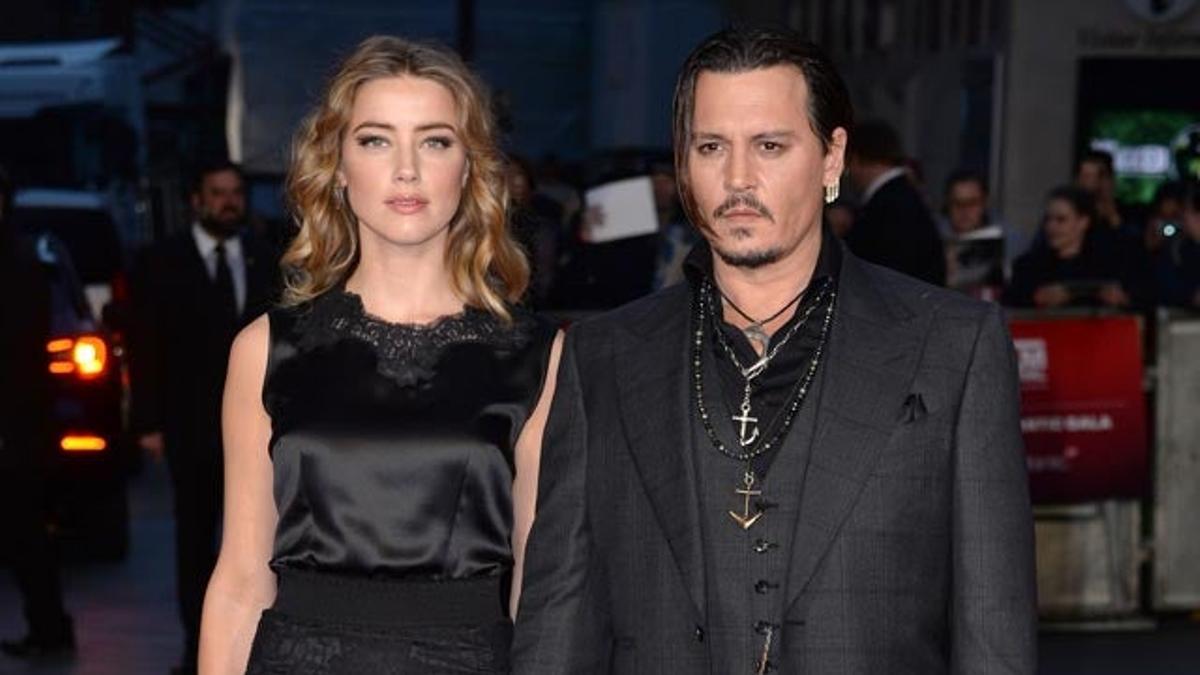 Amber Heard y Johnny Depp, en el estreno de 'Black Mass' en Londres