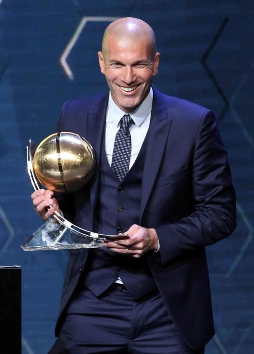 Real Madrid's coach Zinedine Zidane smiles after ...