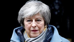 FILE PHOTO: British Prime Minister Theresa May walks outside Downing Street, as she faces a vote on Brexit, in London, Britain March 13, 2019. REUTERS/Henry Nicholls/File Photo