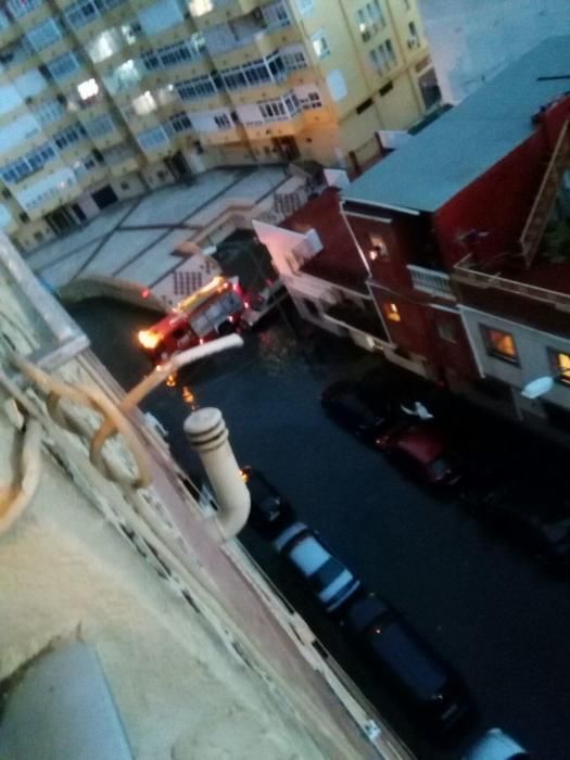 Los efectos de las fuertes lluvias en el barrio de Huelin